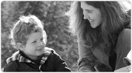 Young child listening to teacher